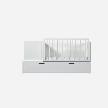 Cama cuna premium convertible Alma Noble en color Blanco alabastro.